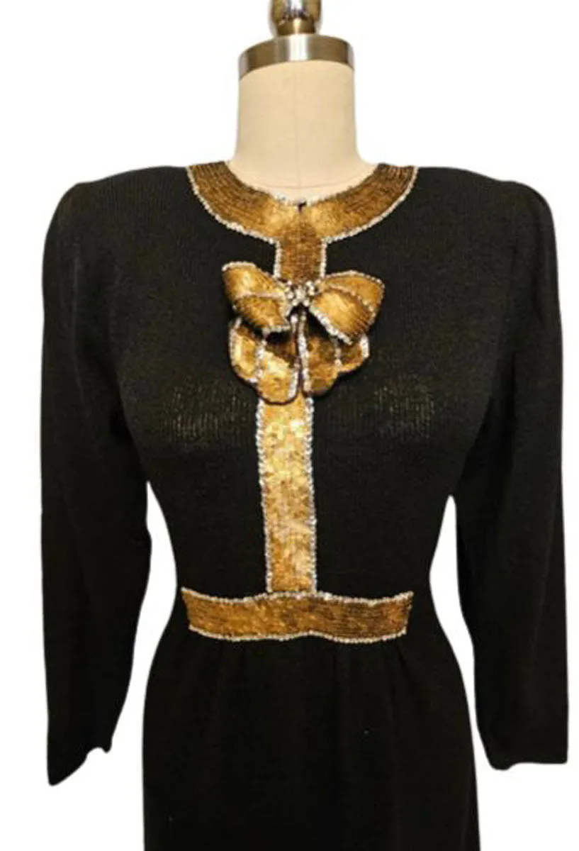 *  VINTAGE LILLIE RUBIN BLACK KNIT EVENINGS DRESS WITH HUGE GOLD AND SILVER SEQUIN BOW ACCENTED WITH SPARKLING RHINESTONES